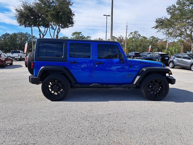 used 2011 Jeep Wrangler Unlimited car, priced at $13,994