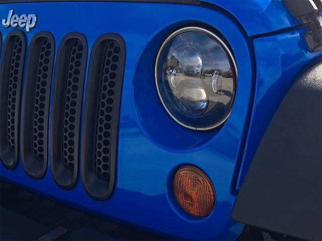 used 2011 Jeep Wrangler Unlimited car, priced at $13,994