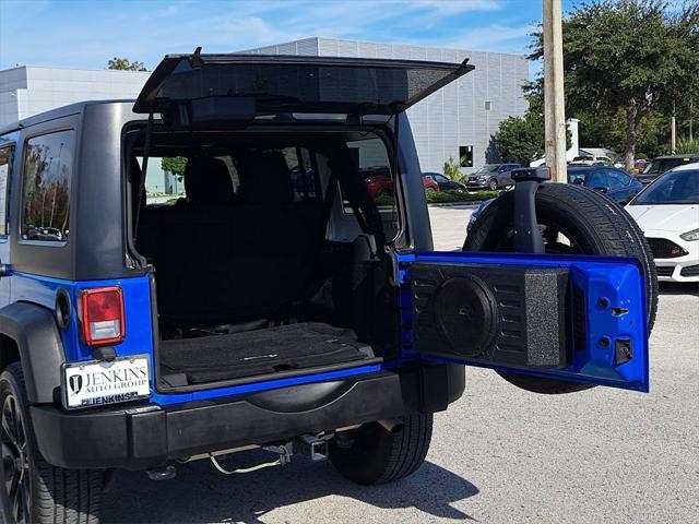 used 2011 Jeep Wrangler Unlimited car, priced at $13,994