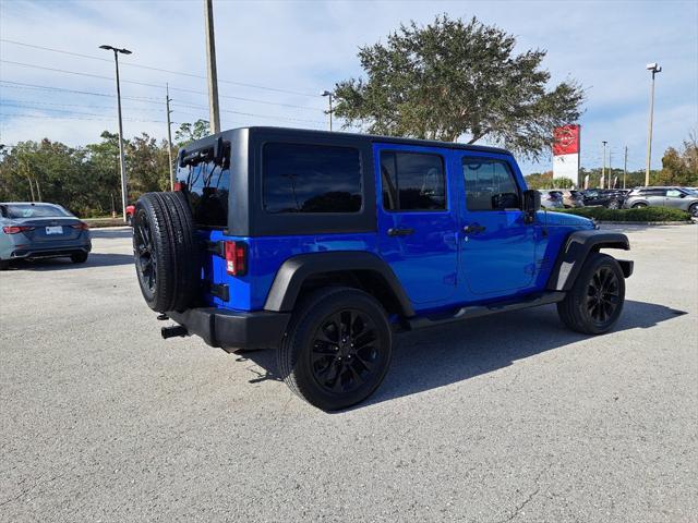 used 2011 Jeep Wrangler Unlimited car, priced at $13,994