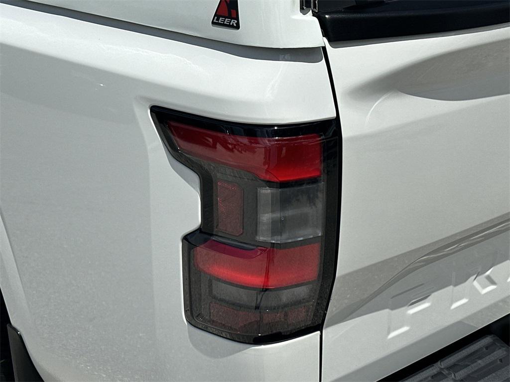 used 2024 Nissan Frontier car, priced at $23,990