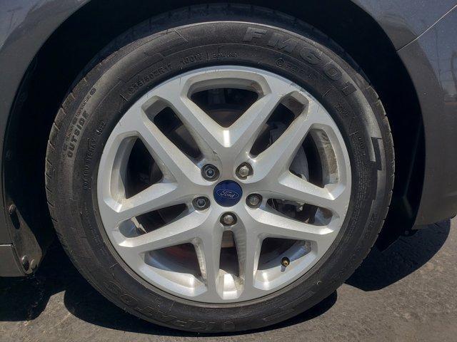 used 2016 Ford Fusion car, priced at $11,995