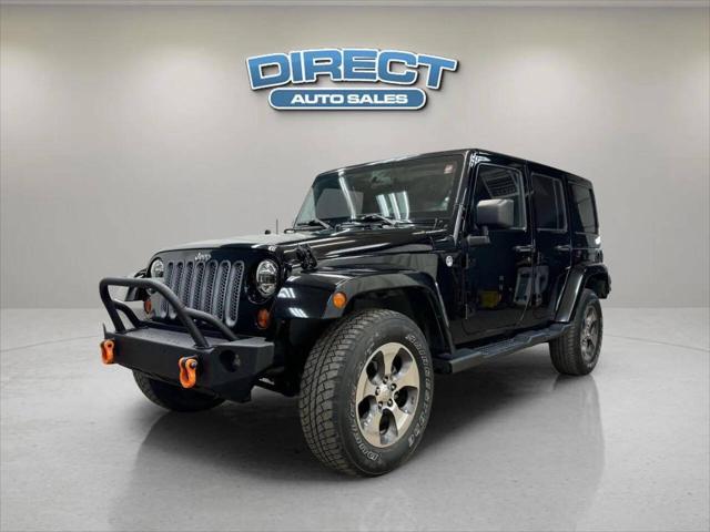 used 2013 Jeep Wrangler Unlimited car, priced at $16,999