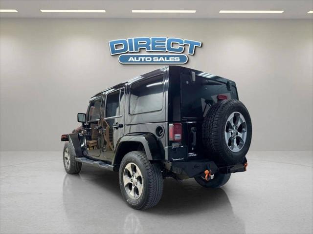 used 2013 Jeep Wrangler Unlimited car, priced at $16,999