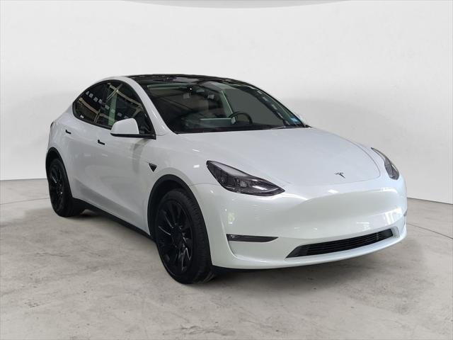 used 2023 Tesla Model Y car, priced at $30,899
