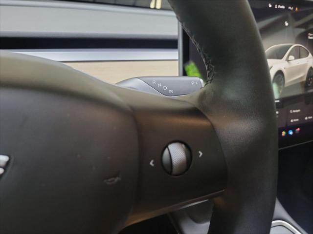 used 2023 Tesla Model Y car, priced at $30,899