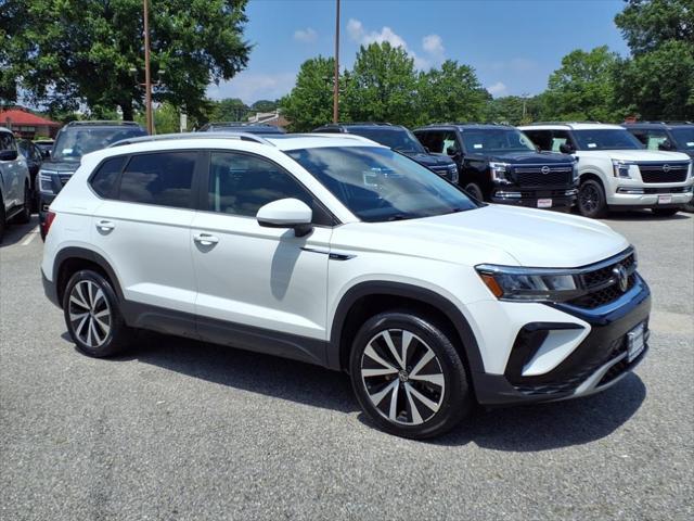 used 2023 Volkswagen Taos car, priced at $22,000