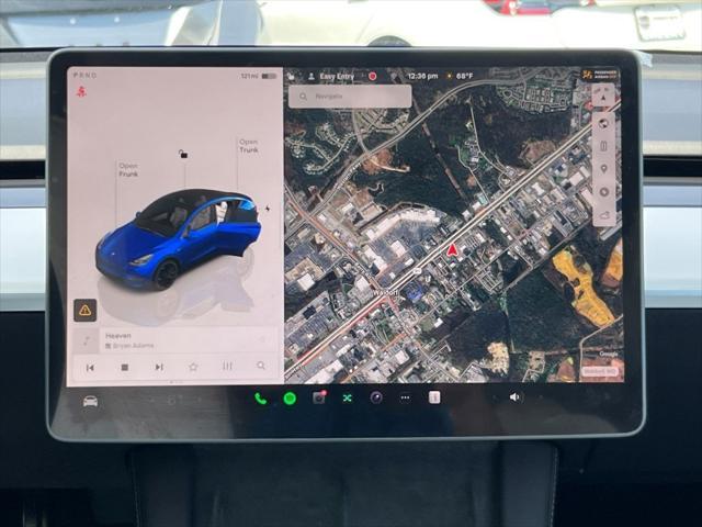 used 2024 Tesla Model Y car, priced at $35,684