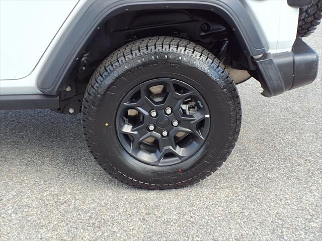 used 2023 Jeep Wrangler 4xe car, priced at $29,539