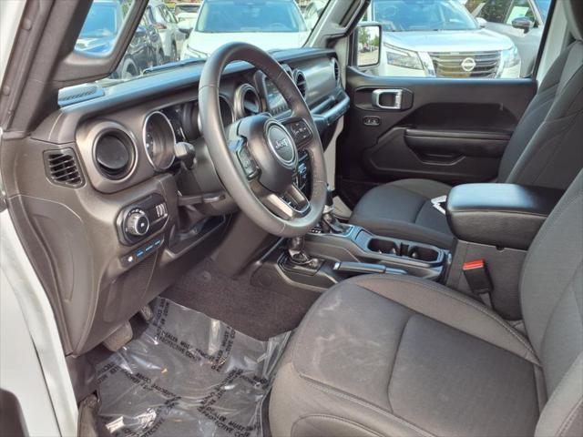 used 2023 Jeep Wrangler 4xe car, priced at $29,539