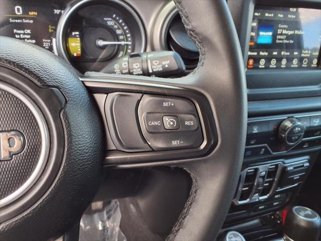 used 2023 Jeep Wrangler 4xe car, priced at $29,539