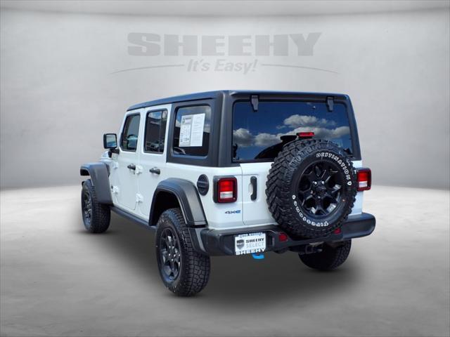 used 2023 Jeep Wrangler 4xe car, priced at $28,333