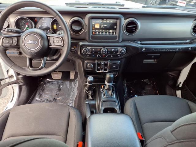 used 2023 Jeep Wrangler 4xe car, priced at $28,333
