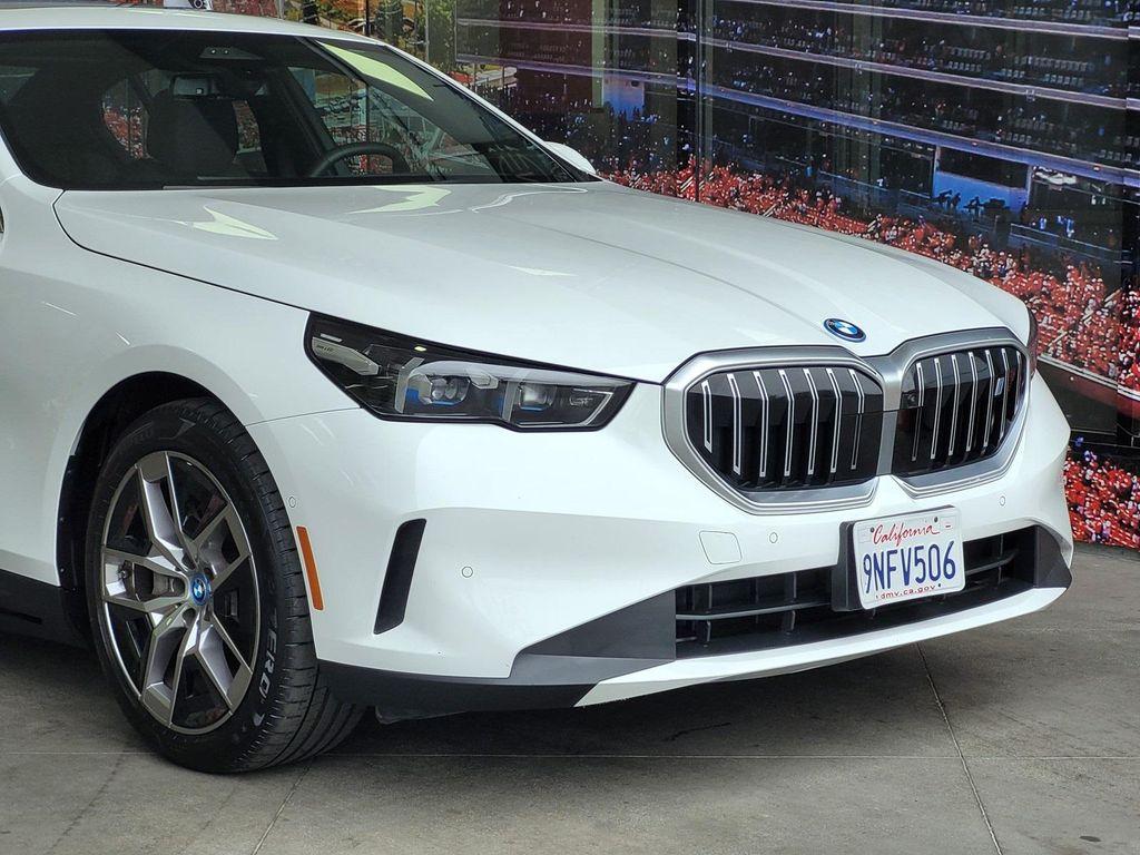 used 2024 BMW i5 car, priced at $45,968