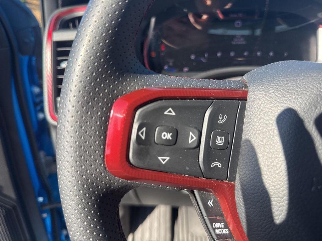 used 2025 Ram 1500 car, priced at $49,989
