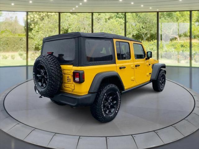 used 2021 Jeep Wrangler Unlimited car, priced at $32,550