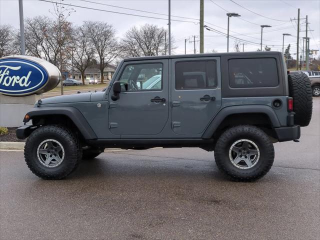 used 2014 Jeep Wrangler Unlimited car, priced at $16,970