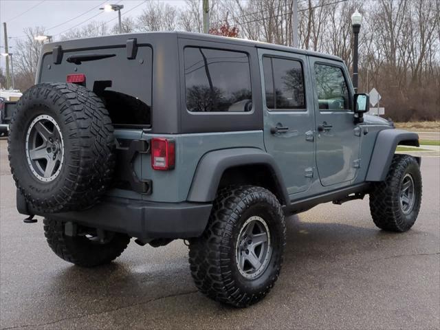 used 2014 Jeep Wrangler Unlimited car, priced at $16,970