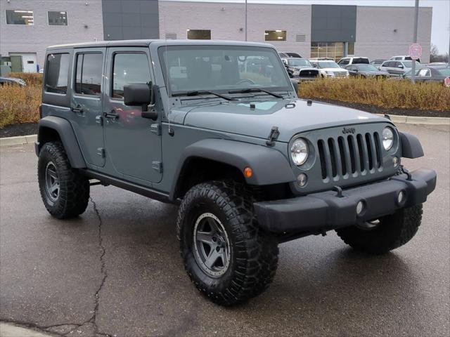 used 2014 Jeep Wrangler Unlimited car, priced at $16,970