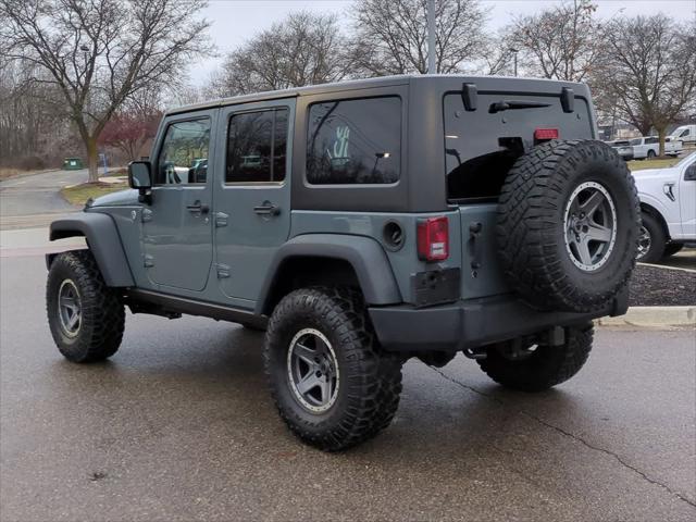 used 2014 Jeep Wrangler Unlimited car, priced at $16,970