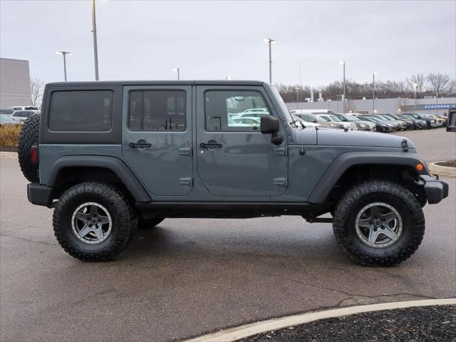 used 2014 Jeep Wrangler Unlimited car, priced at $16,970