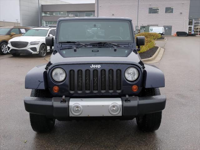 used 2013 Jeep Wrangler Unlimited car, priced at $11,990