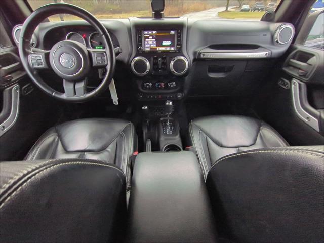 used 2013 Jeep Wrangler Unlimited car, priced at $11,990