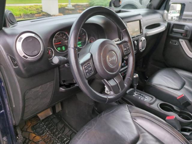 used 2013 Jeep Wrangler Unlimited car, priced at $11,990