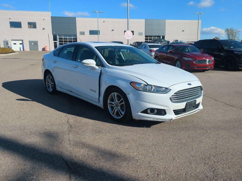 used 2016 Ford Fusion Hybrid car, priced at $3,999