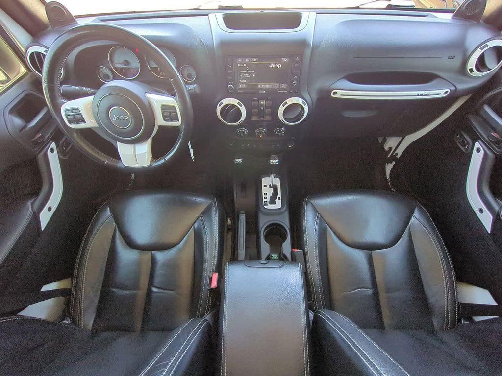used 2014 Jeep Wrangler Unlimited car, priced at $12,999