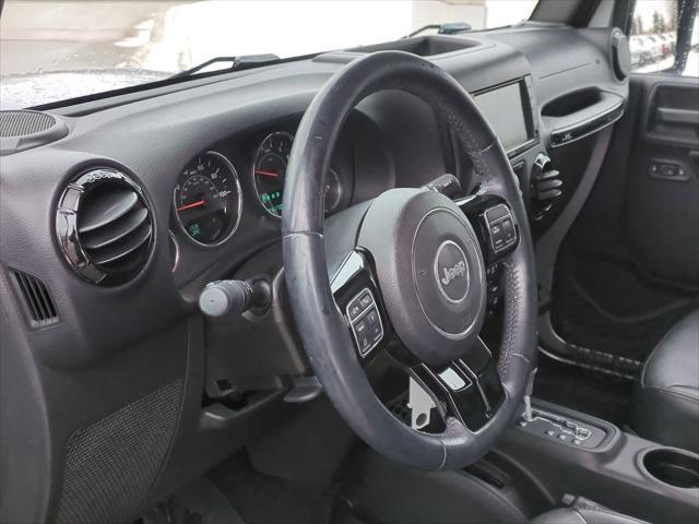 used 2015 Jeep Wrangler Unlimited car, priced at $18,451