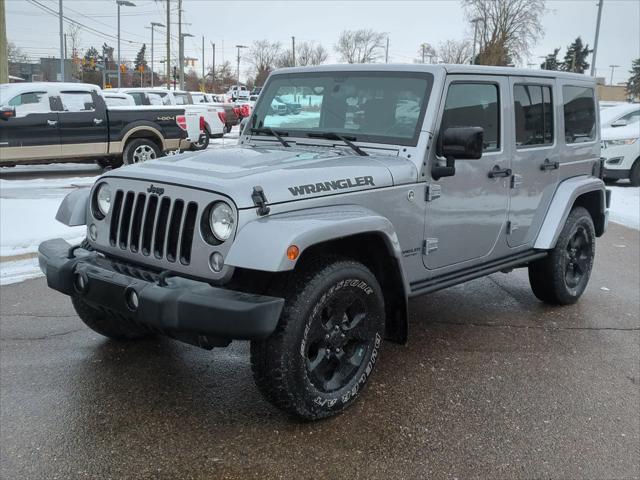 used 2015 Jeep Wrangler Unlimited car, priced at $18,451