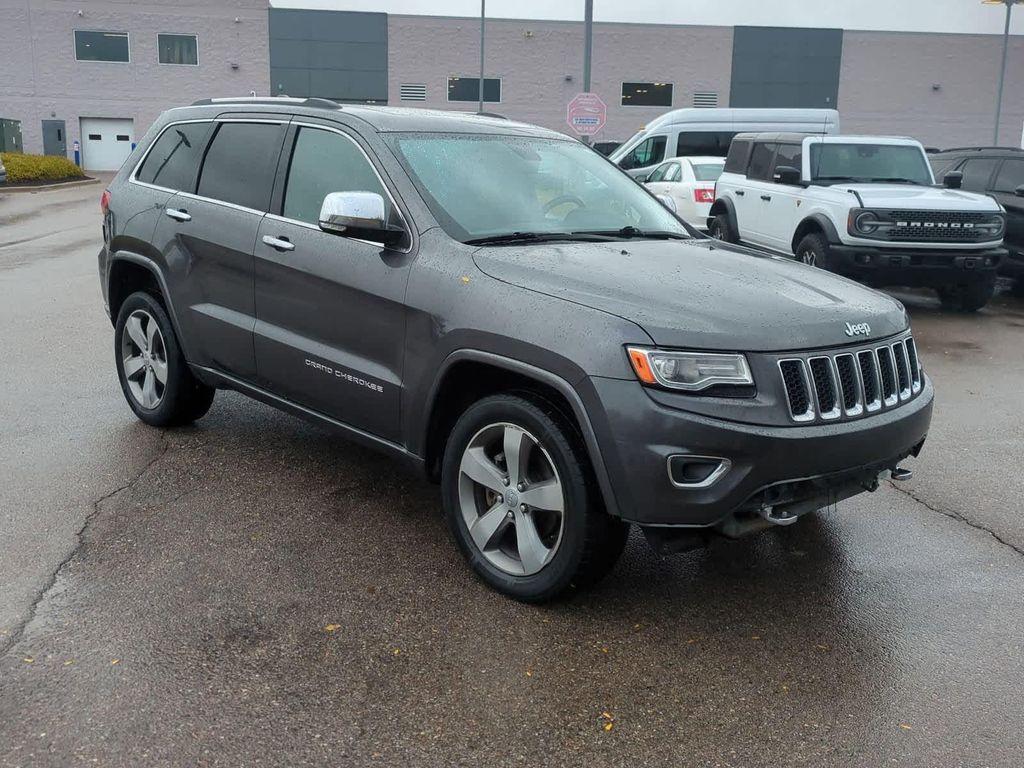 used 2014 Jeep Grand Cherokee car, priced at $3,999