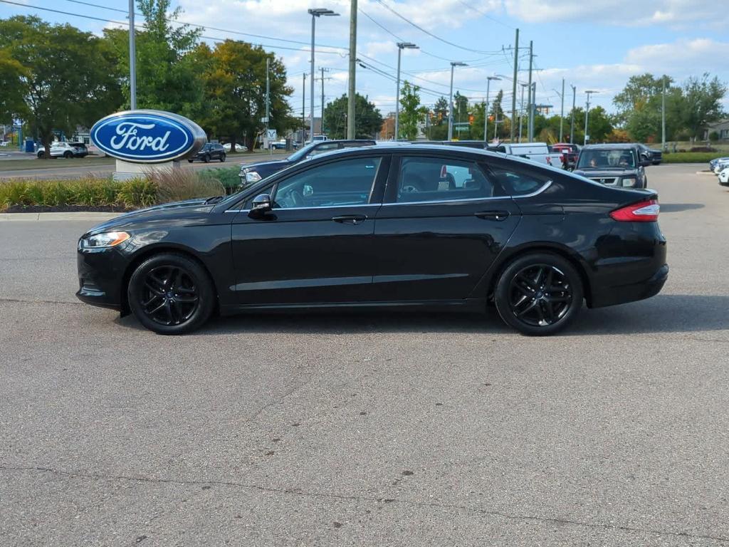 used 2014 Ford Fusion car, priced at $7,499