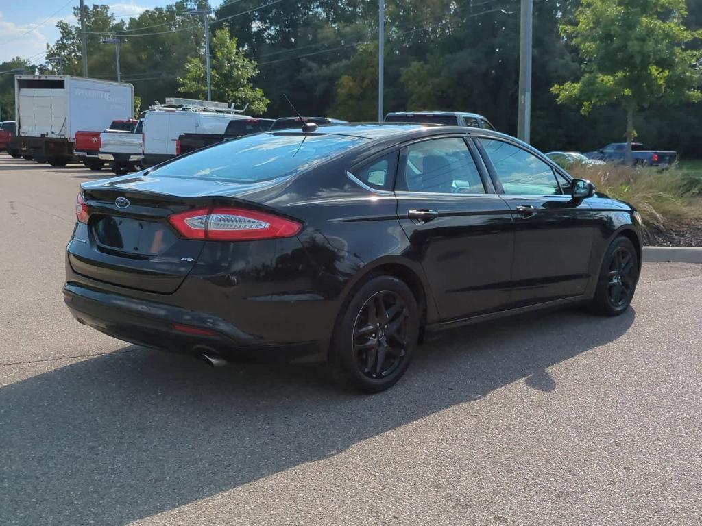 used 2014 Ford Fusion car, priced at $7,499