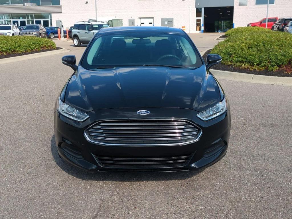 used 2014 Ford Fusion car, priced at $7,499