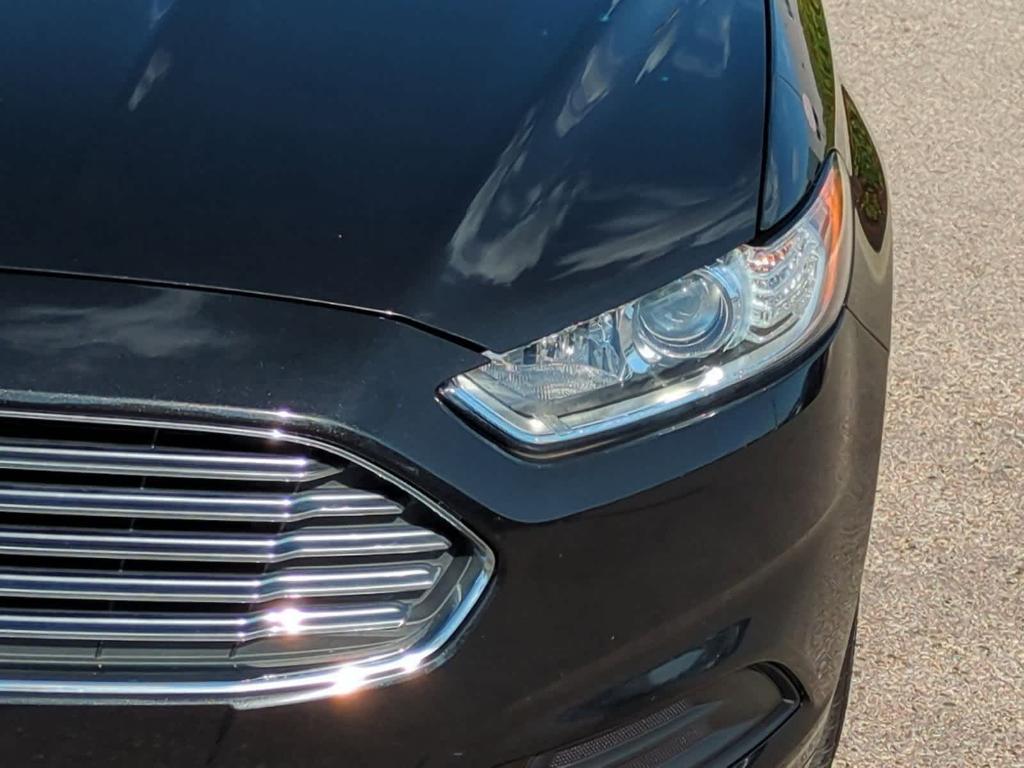 used 2014 Ford Fusion car, priced at $7,499