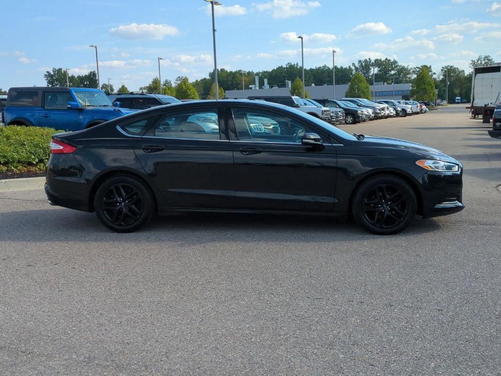 used 2014 Ford Fusion car, priced at $7,499