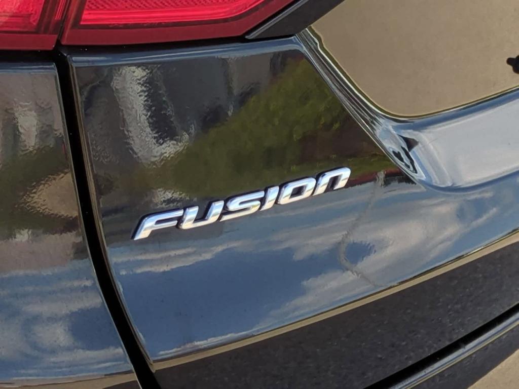 used 2014 Ford Fusion car, priced at $7,499
