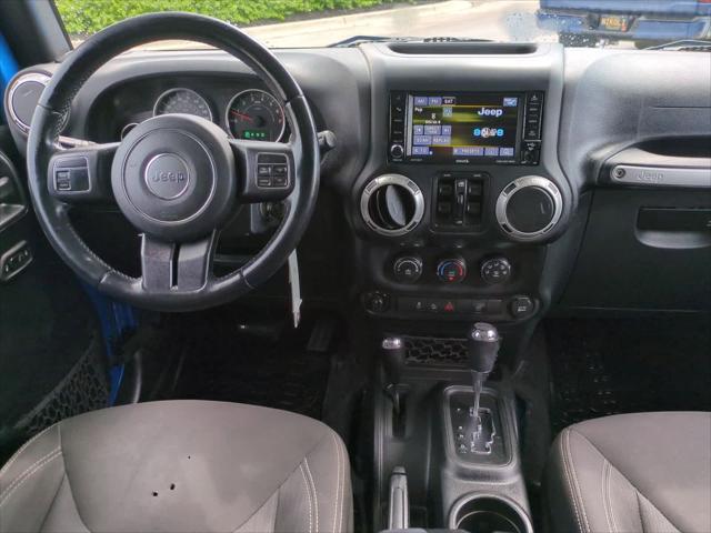 used 2016 Jeep Wrangler Unlimited car, priced at $14,251