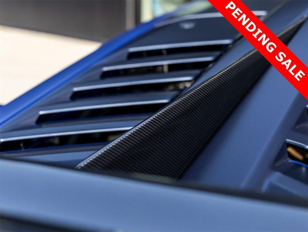 used 2024 Lamborghini Huracan STO car, priced at $589,998