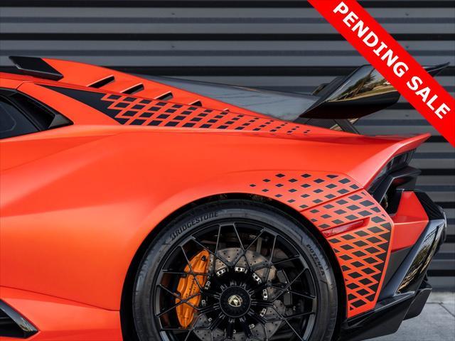 used 2022 Lamborghini Huracan STO car, priced at $374,998