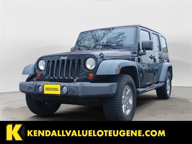 used 2011 Jeep Wrangler Unlimited car, priced at $9,998