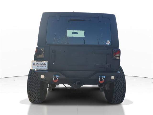 used 2011 Jeep Wrangler Unlimited car, priced at $11,555