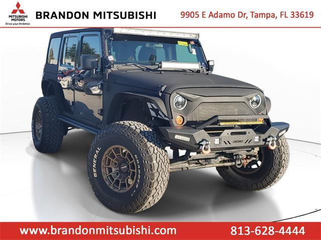 used 2011 Jeep Wrangler Unlimited car, priced at $15,555