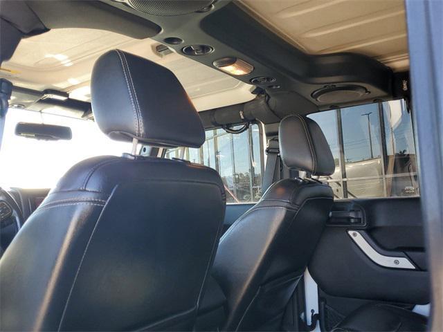 used 2013 Jeep Wrangler Unlimited car, priced at $16,998