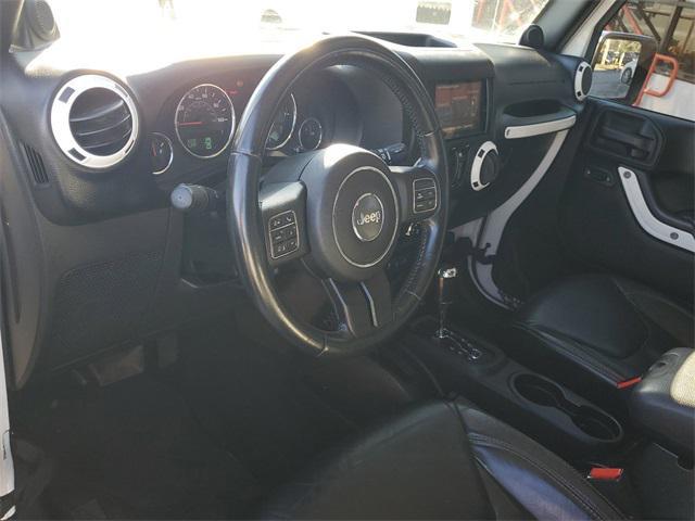 used 2013 Jeep Wrangler Unlimited car, priced at $16,998