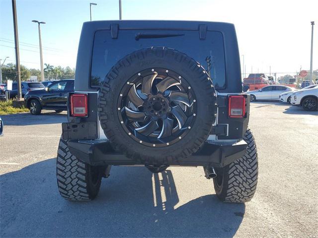 used 2013 Jeep Wrangler Unlimited car, priced at $16,998