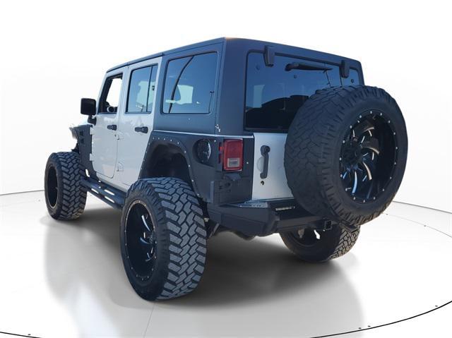 used 2013 Jeep Wrangler Unlimited car, priced at $16,998