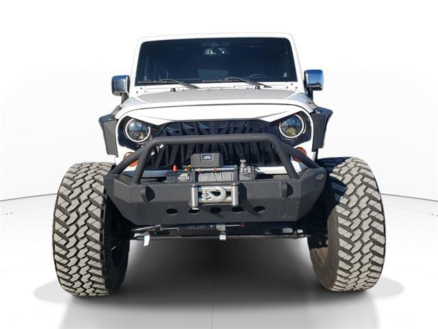 used 2013 Jeep Wrangler Unlimited car, priced at $16,998